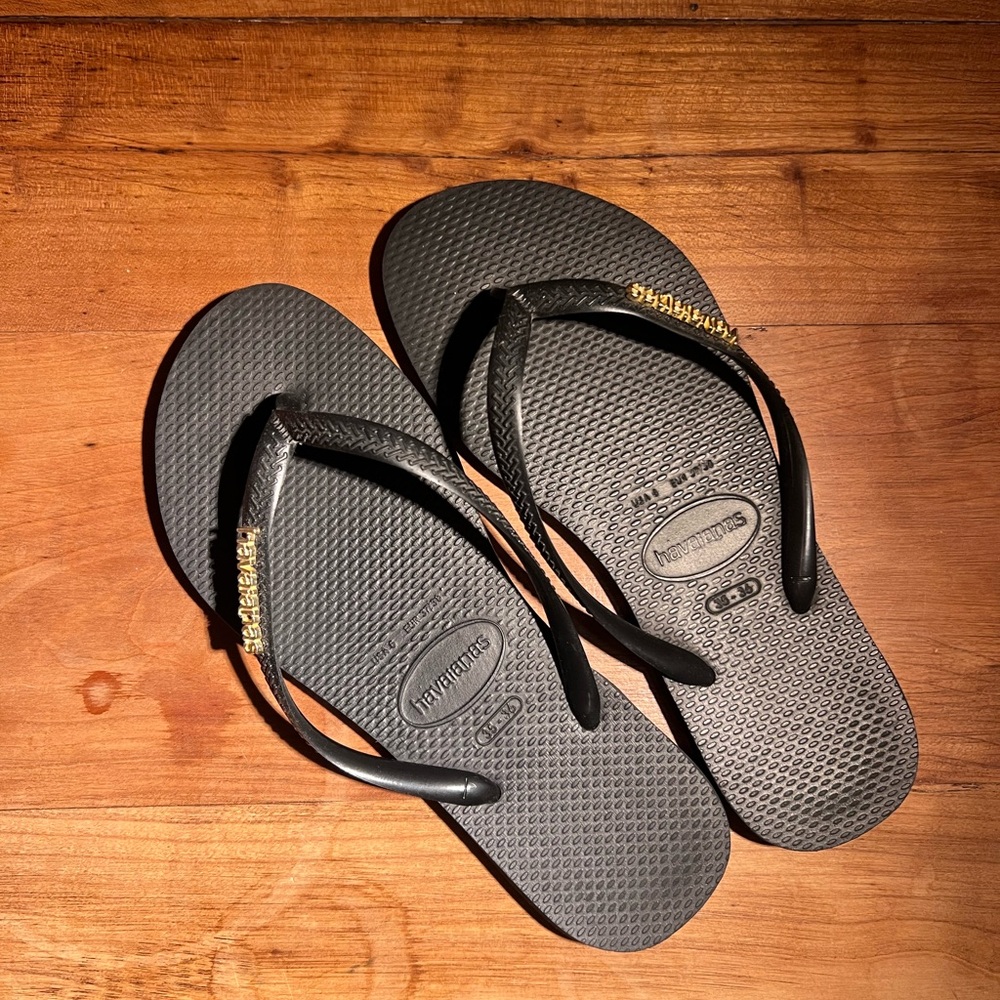 Havaianas Black Flip Flops with Gold Accents